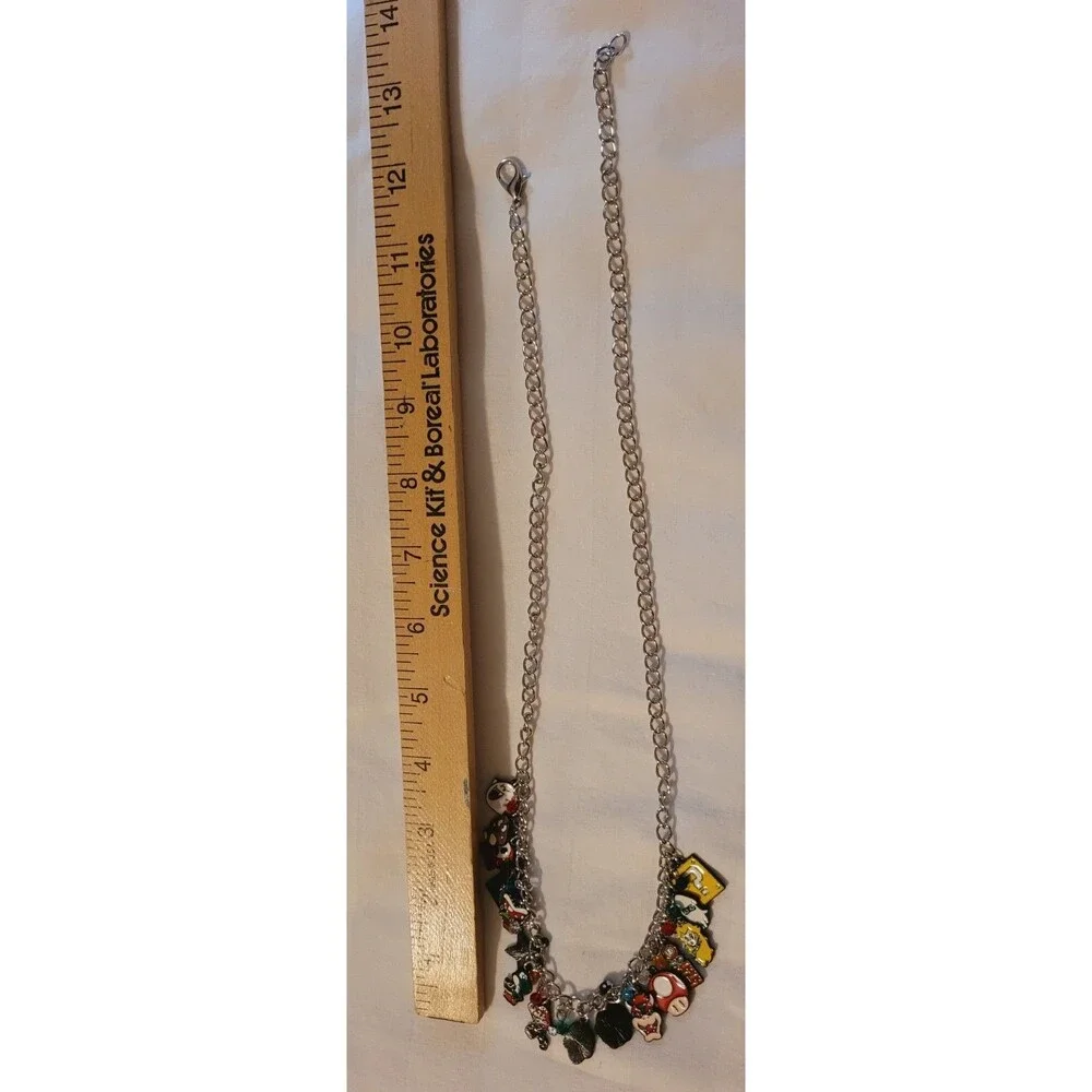 NWOT Super Mario Bros Charm Necklace Mario Luigi Princess Peach Yoshi Boo
